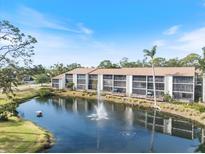 Beautiful waterfront condo complex features a lake with fountain and screened lanais at 1190 Bird Bay Way # 309, Venice, FL 34285