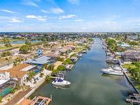 Beautiful waterfront home featuring a private boat dock, boat lift and direct access to the canal at 731 Flamingo Dr, Apollo Beach, FL 33572