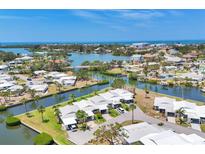A waterfront community featuring lovely homes, canals, and ocean views, perfect for relaxed coastal living at 608 Fair Winds Dr # 608, Nokomis, FL 34275