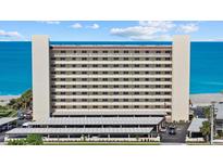Beautiful beachfront condo building with stunning ocean views and covered parking at 255 The Esplanade N # 106, Venice, FL 34285