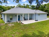 Charming single-story home featuring a basketball hoop and a spacious porch at 3863 Albin Ave, North Port, FL 34286