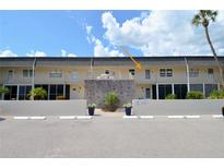 Well-maintained condo complex with lovely landscaping and an inviting facade at 528 Barcelona Ave # 216, Venice, FL 34285