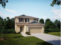 Two-story home with attached garage and neutral exterior at 25242 Paraguay St, Punta Gorda, FL 33983
