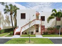 Building exterior showcasing stairs and landscaping at 531 Spring Lakes Blvd # 531, Bradenton, FL 34210