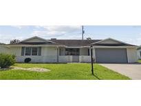 Front view of a ranch-style house at 716 Fox Hills Dr, Sun City Center, FL 33573