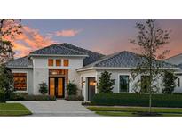 Luxury home with modern architecture and landscaping at 8904 Bernini Pl, Sarasota, FL 34240