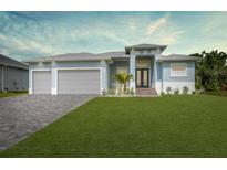 Stunning two-story home with a two-car garage at 6 Fairway Rd, Rotonda West, FL 33947