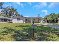 Newly renovated ranch home with carport and large yard at 402 Eunice Dr, Plant City, FL 33563