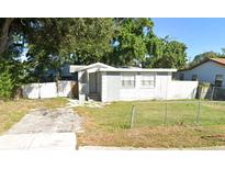 House exterior, front view, small yard at 3023 W Green St, Tampa, FL 33607