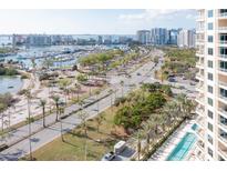 Aerial view of condo building with water and city views at 340 S Palm Ave # 11, Sarasota, FL 34236