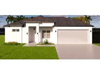 Charming single-story home with a two-car garage and well-manicured lawn at 11322 Zola Ave, Port Charlotte, FL 33981