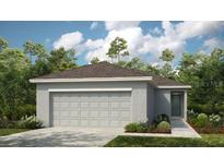 Single-story home with a two-car garage and neutral color scheme at 5807 Laurelcrest Gln, Palmetto, FL 34221