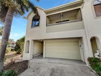 Two-story condo with attached garage and balcony at 2364 Hanover Dr, Dunedin, FL 34698