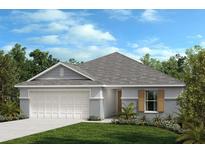 Charming one-story home with a two-car garage, well-maintained lawn, and manicured landscaping at 6609 Tortoise Trl, Parrish, FL 34219