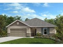 Charming single-story home with a two-car garage, manicured lawn, and lush landscaping at 6626 Tortoise Trl, Parrish, FL 34219