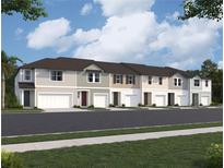 Charming new townhomes with welcoming garages and colorful exteriors at 7268 Deer Valley Circle, Tampa, FL 33635