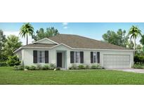 Charming single-story home with a two-car garage, lush lawn, and a welcoming front entrance at 469 Chubut Ct, Punta Gorda, FL 33983