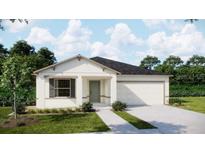 Charming single-story home featuring a two-car garage and well-maintained landscaping at 25880 Prada Dr, Punta Gorda, FL 33955