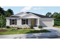 Charming single-story home with a stone facade, well-manicured lawn, and a two-car garage at 2349 Broadpoint Dr, Punta Gorda, FL 33983