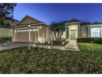 Charming one-story home featuring well-maintained landscaping and a two-car garage at 6741 64Th E Ter, Bradenton, FL 34203