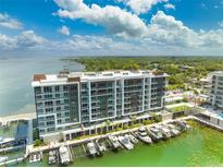 Stunning condo building with a marina providing waterfront views, and boat docks at 920 N Osceola Ave # 803, Clearwater, FL 33755