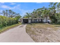Charming home with covered parking and a well-maintained front yard at 3424 19Th N St, St Petersburg, FL 33713