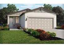 Charming single-story home with a neutral color scheme and beautifully landscaped front yard at 137 Whiteland Bnd, Nokomis, FL 34275