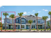 Charming townhome featuring a landscaped entrance, multiple stories, and a modern architectural design at 17378 Alderwood Ln, Punta Gorda, FL 33982