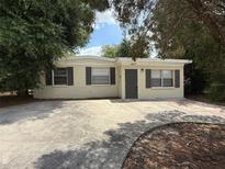 Charming home with a large driveway and curb appeal at 4617 John Bell Jr Dr, Tampa, FL 33610