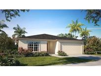Charming single-story home with manicured lawn, landscaping, a two-car garage and a welcoming facade at 16408 Courlan Rd, Weeki Wachee, FL 34614