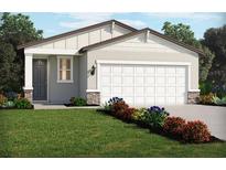 Charming single-story home with a gray exterior, white garage door, landscaped yard, and covered entryway at 14005 Crutchfield Ct, Parrish, FL 34219