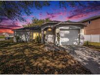Charming single-story home with attached garage and landscaped front yard at 4601 Copper Ln, Plant City, FL 33566