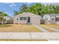 Charming single-story home with a well-maintained lawn and concrete driveway at 3944 11Th S Ave, St Petersburg, FL 33711