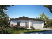 Charming single-story home with a two-car garage, landscaped front yard, and a welcoming red front door at 28166 S Twin Lakes Dr, Punta Gorda, FL 33955