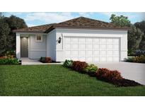 Charming single-Gathering home featuring a two-car garage, neutral paint and a beautifully landscaped front yard at 1847 Brekey Way, Zephyrhills, FL 33541