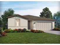 Charming single-story home featuring a two-car garage, neutral color palette, and a well-manicured lawn with colorful landscaping at 7728 Gilchrist Springs Dr, Parrish, FL 34219