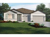 Inviting single-Gathering home with a well-manicured lawn and a two-car garage at 1799 Draughton Dr, Zephyrhills, FL 33541