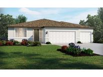 Charming single-story home with a two-car garage, well-manicured lawn, and colorful landscaping at 1775 Draughton Dr, Zephyrhills, FL 33541