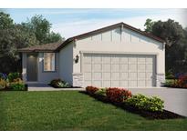Charming single-story home with a well-manicured lawn and a neutral color scheme at 3674 Moscato Dr, Brooksville, FL 34602