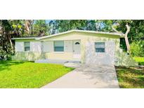 Charming single-story home with a well-manicured lawn and inviting front entrance at 2731 Union S St, St Petersburg, FL 33712