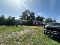 View of the property and front yard at 1009 S Clark Ave, Tampa, FL 33629