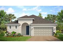 Charming single-story home with a two-car garage, arched entryway, and well-maintained landscaping at 9581 Vibrant Lane, Venice, FL 34292