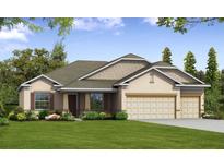 Charming one-story home with a manicured lawn and a two-car garage at 3441 Gramercy Ln, Spring Hill, FL 34609