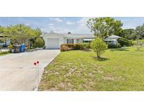 Charming single story home with well-maintained lawn and mature landscaping at 8490 7Th Ln N,, St Petersburg, FL 33702