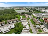 Aerial view showing condo community location and surrounding area at 4901 Onyx Ln # 101, New Port Richey, FL 34652