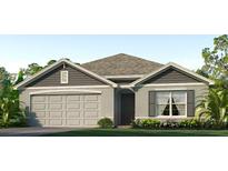 Modern one-story home with gray siding and shutters at 7653 Rome Ln, Brooksville, FL 34613