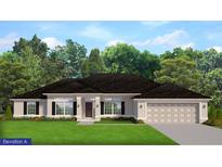 One-story home with dark roof, beige walls, and a two-car garage at 281 Killinger Ave, Spring Hill, FL 34606