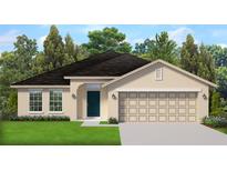 One-story home with a two-car garage and attractive landscaping at 13271 Gulf Bay Ln, Spring Hill, FL 34609