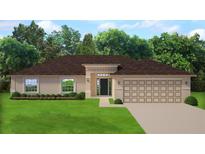 Charming single-story home with a two-car garage, manicured lawn, and inviting entryway at 4476 Azora Rd, Spring Hill, FL 34608