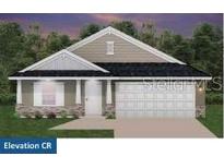 Charming single-story home featuring a gabled roof, stone accents, and an attached two-car garage at 4861 Sutherland St # Lot 56, Spring Hill, FL 34609